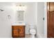 Cozy bathroom featuring a wood vanity and tiled floors at 1730 W Pershing Ave, Phoenix, AZ 85029