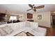 Bright living room featuring hardwood floors, comfortable seating, and a view of the dining area for easy entertaining at 1920 E Manzanita Dr, Phoenix, AZ 85020