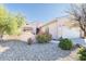 Charming single-story home with desert landscaping, a two-car garage, and a covered entrance at 19217 N Casa Blanca Way, Surprise, AZ 85387