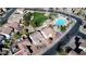 A high-angle view of a home with a community pool and park nearby at 1998 S Starling Dr, Gilbert, AZ 85295