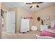 Comfortable bedroom with carpet flooring, bright white trim, white furniture, and a ceiling fan for added comfort at 1998 S Starling Dr, Gilbert, AZ 85295