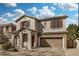 Charming two-story home with a two-car garage and beautiful desert landscaping at 1998 S Starling Dr, Gilbert, AZ 85295