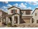 Charming two-story home with a two-car garage and beautiful desert landscaping at 1998 S Starling Dr, Gilbert, AZ 85295