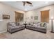 Comfortable living room featuring neutral walls, plush couches, and natural light at 1998 S Starling Dr, Gilbert, AZ 85295