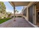 Covered patio with brick flooring perfect for outdoor seating and relaxation with a view of the backyard at 1998 S Starling Dr, Gilbert, AZ 85295