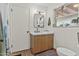 Bathroom featuring a modern vanity, updated mirror and a shower with a tiled showerhead at 2007 S El Camino Dr, Tempe, AZ 85282