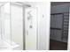 Bathroom featuring a glass enclosed shower and custom closet shelving at 20471 E Carriage Way, Queen Creek, AZ 85142