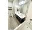 Bathroom featuring double sinks, a soaking tub, and tile flooring at 20471 E Carriage Way, Queen Creek, AZ 85142