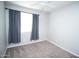 Bedroom featuring a window and modern ceiling fan at 20471 E Carriage Way, Queen Creek, AZ 85142