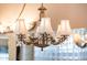 A chandelier with crystal adornments at 22020 N San Ramon Dr, Sun City West, AZ 85375