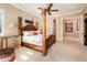 Comfortable main bedroom featuring a four-poster bed, and neutral color scheme at 22020 N San Ramon Dr, Sun City West, AZ 85375