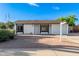 Charming single-story home featuring low-maintenance landscaping and an attached one-car garage at 2336 W Plata Ave, Mesa, AZ 85202