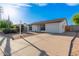 Inviting single-story home with a long driveway and attached garage, perfect for easy access at 2336 W Plata Ave, Mesa, AZ 85202