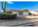 Cozy single-story home with desert landscaping, attached garage, and covered parking at 2336 W Plata Ave, Mesa, AZ 85202