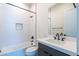 Modern bathroom featuring a white tub, textured walls, and sleek black fixtures, offering a clean aesthetic at 24066 S 218Th Pl, Queen Creek, AZ 85142