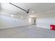 Spacious two car garage with white walls and sealed concrete floor at 24066 S 218Th Pl, Queen Creek, AZ 85142