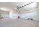 Spacious two car garage with white walls and sealed concrete floor at 24066 S 218Th Pl, Queen Creek, AZ 85142