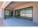 View of backyard from covered patio with sliding glass doors at 24066 S 218Th Pl, Queen Creek, AZ 85142