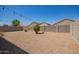 Zero maintenance backyard with gravel and block wall fencing at 2420 E San Borja Trl, Casa Grande, AZ 85194