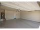 Spacious, clean garage with painted floors and a water heater at 2420 E San Borja Trl, Casa Grande, AZ 85194