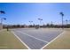 Well-maintained tennis court with lighting for evening play, perfect for sports enthusiasts at 2420 E San Borja Trl, Casa Grande, AZ 85194