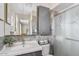 Modern bathroom with a decorative shower, gray tiled walls, and sleek vanity at 2747 S Brooks --, Mesa, AZ 85202