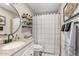 Bathroom featuring an elegant countertop, sleek black fixtures, and decorative accents at 2747 S Brooks --, Mesa, AZ 85202