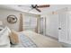 Relaxing bedroom with a ceiling fan, plantation shutters, and a closet with sliding doors at 2747 S Brooks --, Mesa, AZ 85202