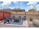 Cozy backyard fire pit area with seating for gathering and relaxing outdoors at 2747 S Brooks --, Mesa, AZ 85202