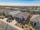 Aerial view of the home in a residential neighborhood at 30747 W Indianola Ave, Buckeye, AZ 85396