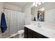 Bathroom featuring a single sink vanity, toilet, shower and tub combo at 30747 W Indianola Ave, Buckeye, AZ 85396