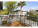 Balcony view of the home with exterior features and surrounding trees and blue skies at 324 W Culver St # 2, Phoenix, AZ 85003