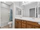 Bathroom featuring a shower and tub combination, a double sink vanity, and ample space at 337 S 172Nd Dr, Goodyear, AZ 85338