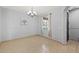 The dining room features tile floors and a modern chandelier at 337 S 172Nd Dr, Goodyear, AZ 85338