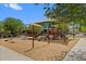 Community playground offering a fun area for with swings, slides, and play structures at 337 S 172Nd Dr, Goodyear, AZ 85338