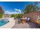 Entertain your friends and Gathering with the outdoor table set next to the built in spa and pool at 3546 E Latham Way, Gilbert, AZ 85297