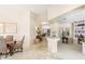 Bright entryway showcasing tile flooring, decorative mirrors, and glimpses of the open living spaces at 3546 E Latham Way, Gilbert, AZ 85297