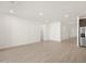 Spacious living area with wood-look tile flooring, neutral paint, and lots of natural light at 3782 N Camden Dr, Florence, AZ 85132