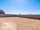 Spacious backyard surrounded by tall block wall, providing privacy at 3864 N Camden Dr, Florence, AZ 85132