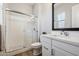 Elegant bathroom with a glass-enclosed shower, subway tile surround, and modern fixtures at 4097 E Tonto Pl, Chandler, AZ 85249