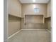 A walk-in closet with shelving and a small window for natural light at 41413 N Club Pointe Dr, Anthem, AZ 85086