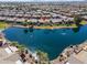 Gorgeous aerial view of the home with a beautiful lake view in a desirable community at 42432 W North Star Dr, Maricopa, AZ 85138