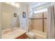 This lovely bathroom features a shower over tub and a vanity sink at 42432 W North Star Dr, Maricopa, AZ 85138