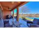 Enjoy scenic views from this spacious covered patio, perfect for entertaining at 42432 W North Star Dr, Maricopa, AZ 85138