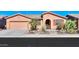 Charming single-story home with desert landscaping, complemented by a two-car garage at 42432 W North Star Dr, Maricopa, AZ 85138