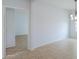 Hallway with tile flooring and views to the dining area at 42432 W North Star Dr, Maricopa, AZ 85138