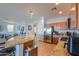 View of kitchen with granite countertops and stainless steel appliances at 42432 W North Star Dr, Maricopa, AZ 85138