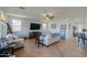 Cozy living room with tile flooring and comfortable seating at 42432 W North Star Dr, Maricopa, AZ 85138