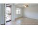 Bright living room with tile flooring, a ceiling fan, and a window with street view at 42432 W North Star Dr, Maricopa, AZ 85138
