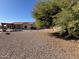 Large backyard with desert landscaping, perfect for easy maintenance at 4511 S 181St Ave, Goodyear, AZ 85338